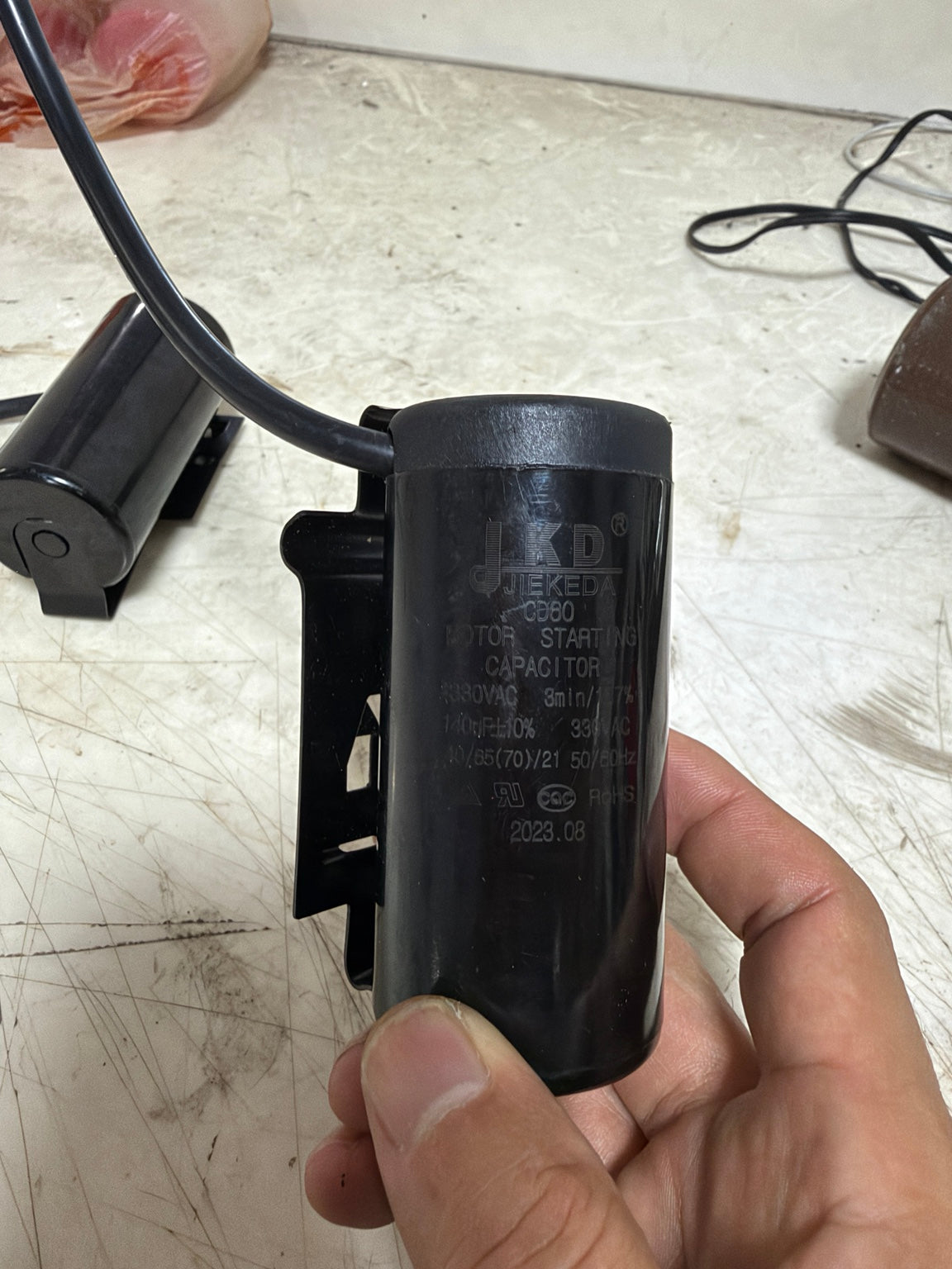 JIEKEDA CD60 140uF 330VAC motor starting capacitor with lead wires