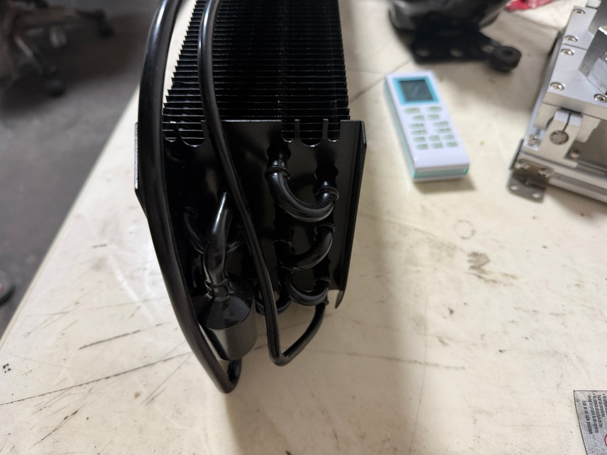 Commercial refrigeration evaporator coil 28 x 6 x 3.5 inches side view with tubing